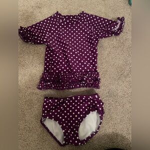 Ruffle Butts short sleeve 2 piece bathing suit.